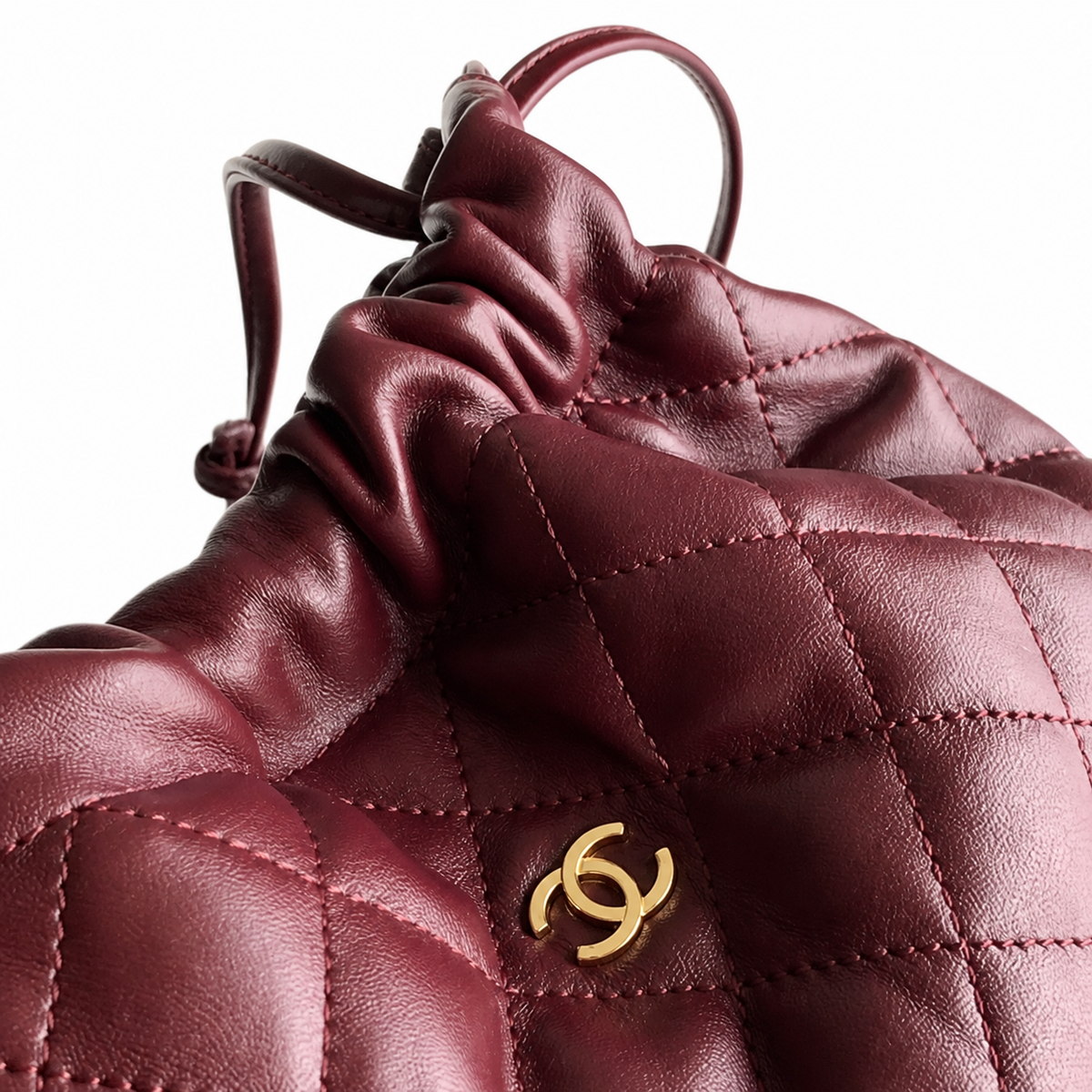 Chanel Burgundy Quilted Lambskin Drawstring Bucket | Tonal CC Coin Discs & Gold CC — 22cm