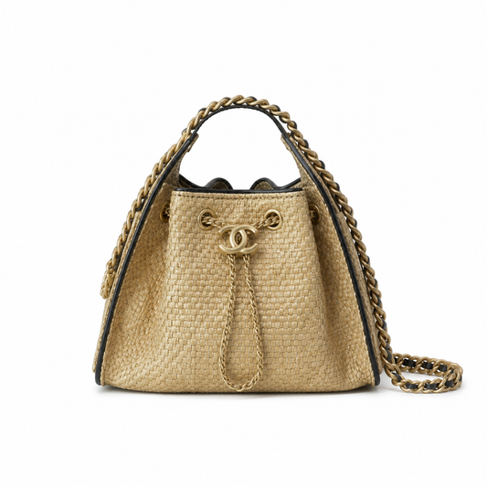 Chanel Raffia Drawstring Bucket Bag Natural Beige | Oversized Gold CC Medallion — 22cm