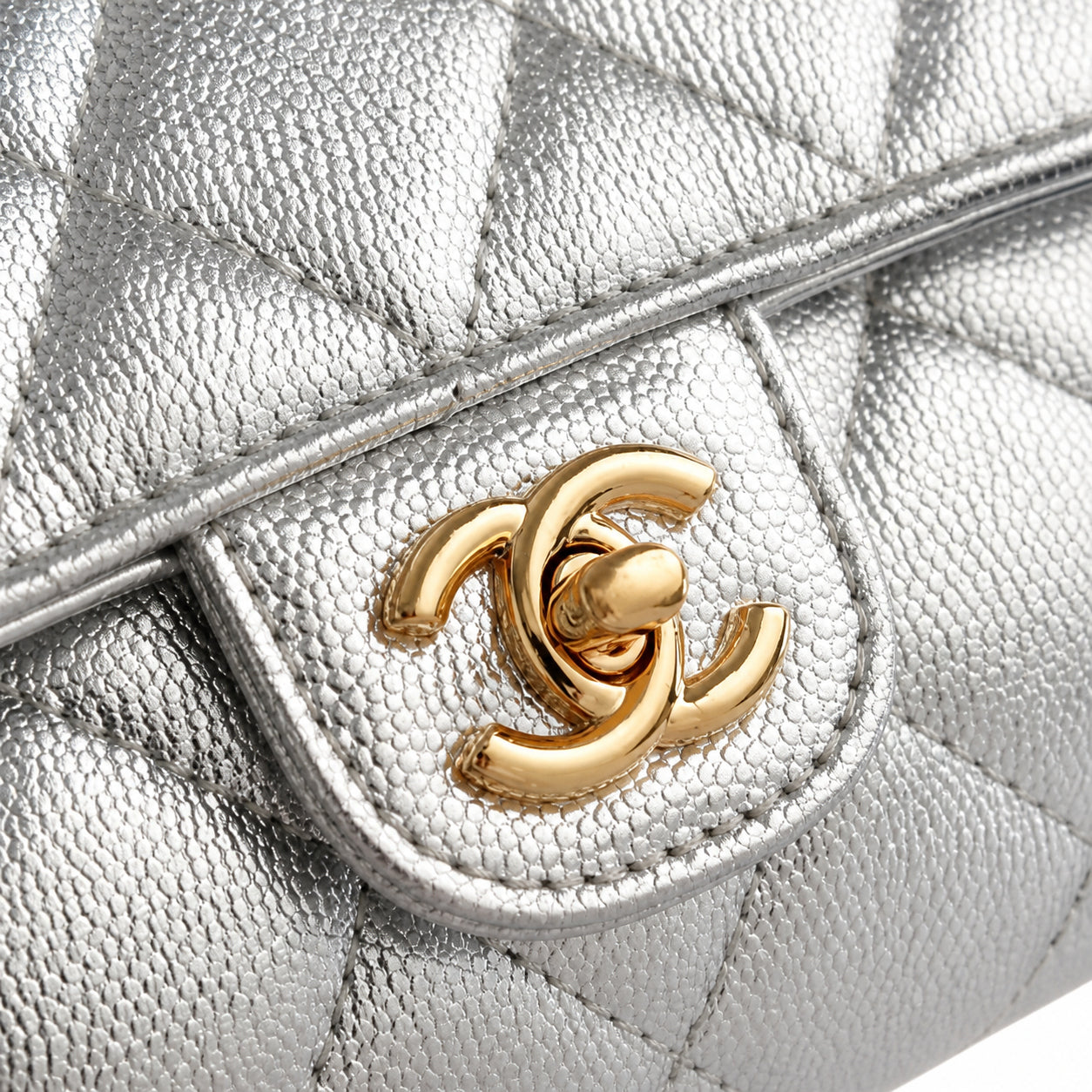Chanel CC Quilted Cylindrical Flap Bag | Silver Metallic & Gold — 25cm
