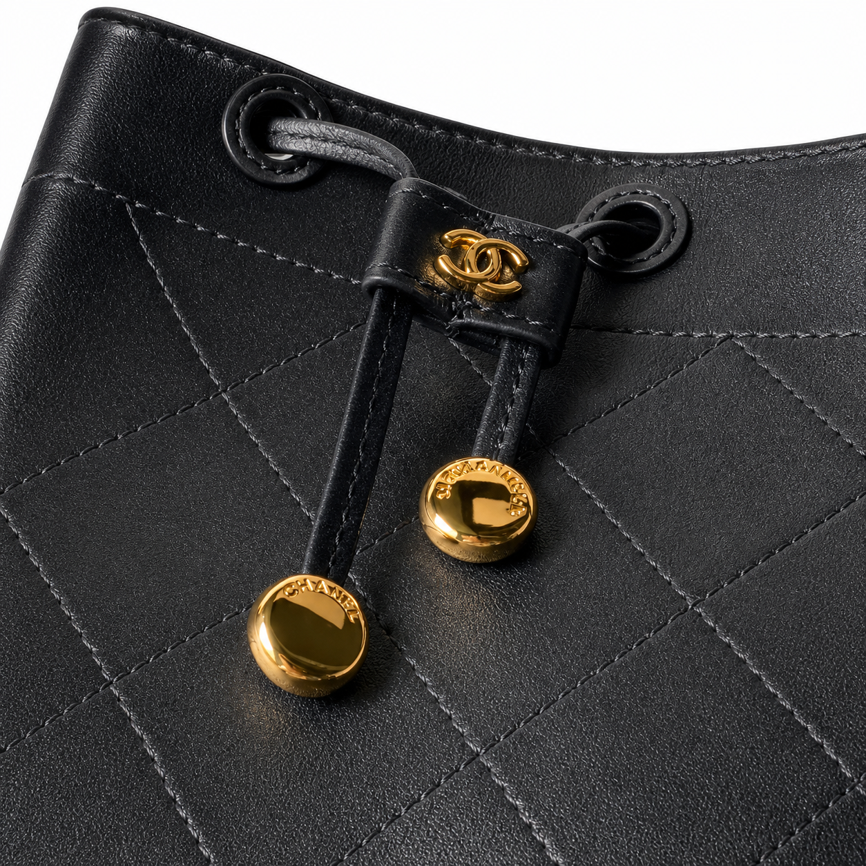 Chanel Bucket Bag Black Quilted Lambskin | Gold CC Drawstring & Mauve Interior — 23cm