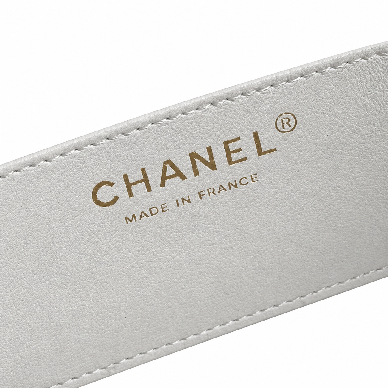 Chanel Mini Quilted Flap Bag White Lambskin | Black Enamel CHANEL Bar Clasp — 18cm