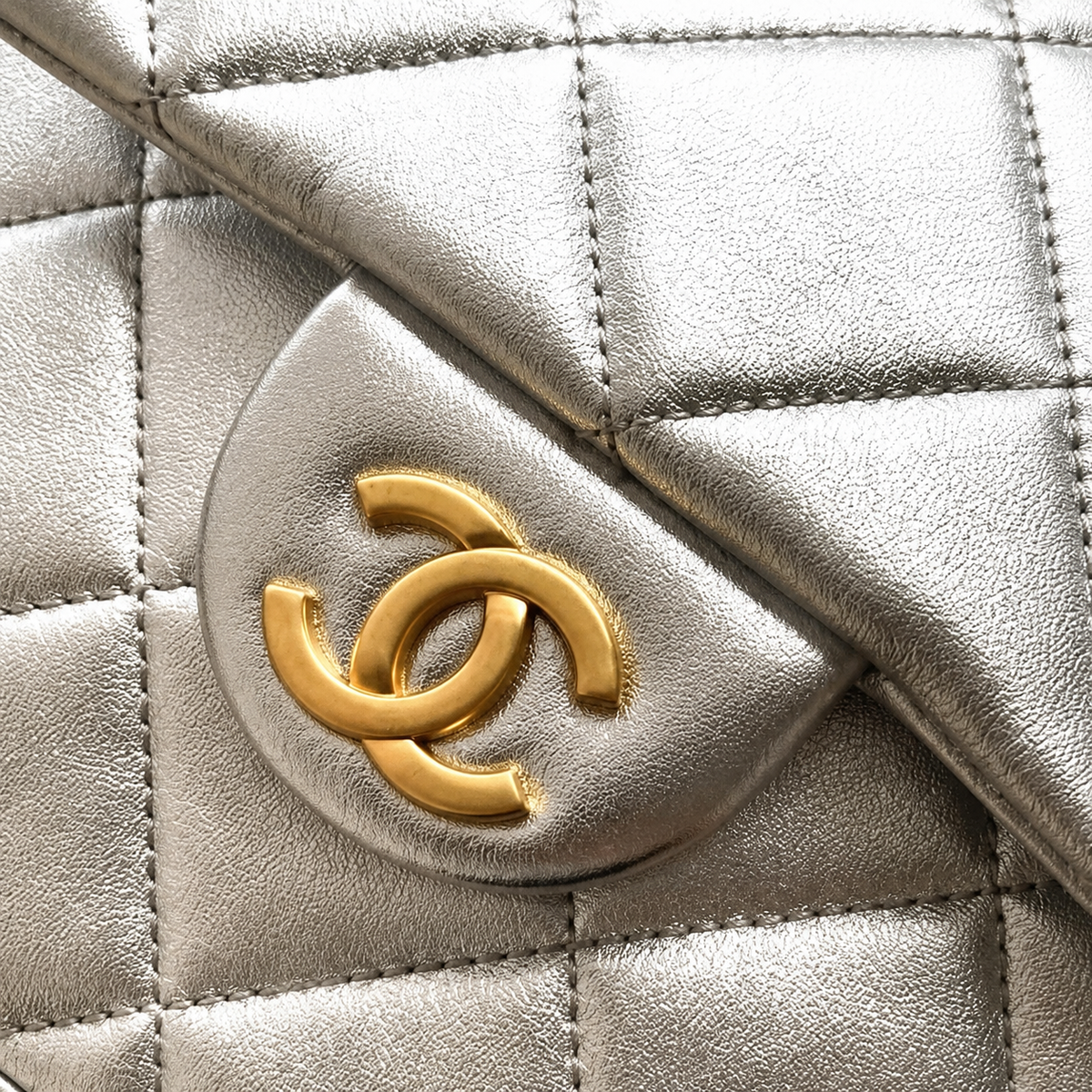 Chanel Metallic Quilted Mini Backpack | Gold Chain Silver Leather — 22cm
