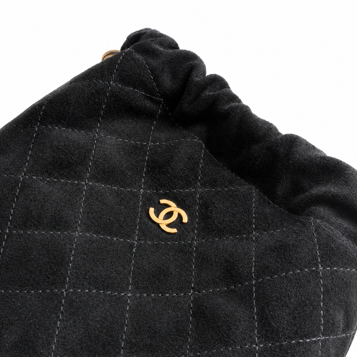 Chanel Black Quilted Suede Drawstring Bucket Bag | Gold CC Charm & D-Ring — 22cm