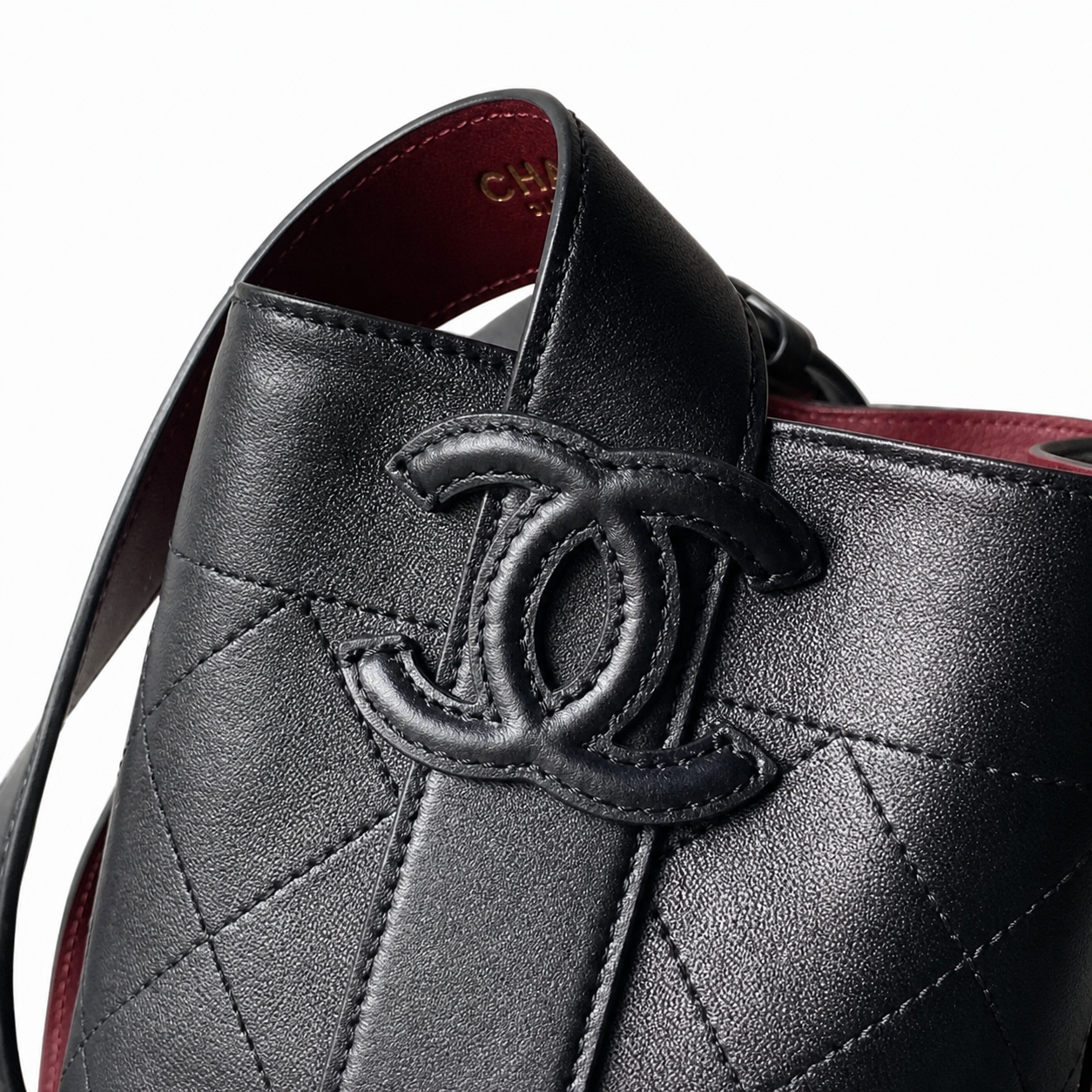 Chanel Bucket Bag Black Quilted Lambskin | Gold CC Drawstring & Mauve Interior — 23cm