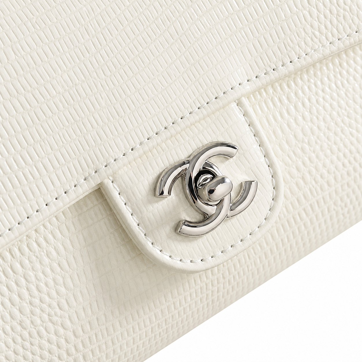 Chanel CC Embossed Cylindrical Flap Bag | White & Silver — 25cm